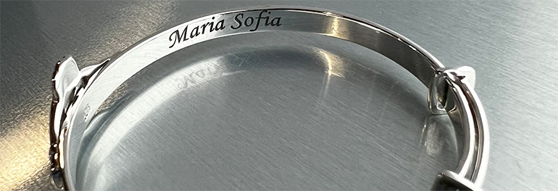 example of engraving inside a sterling silver babies bangle